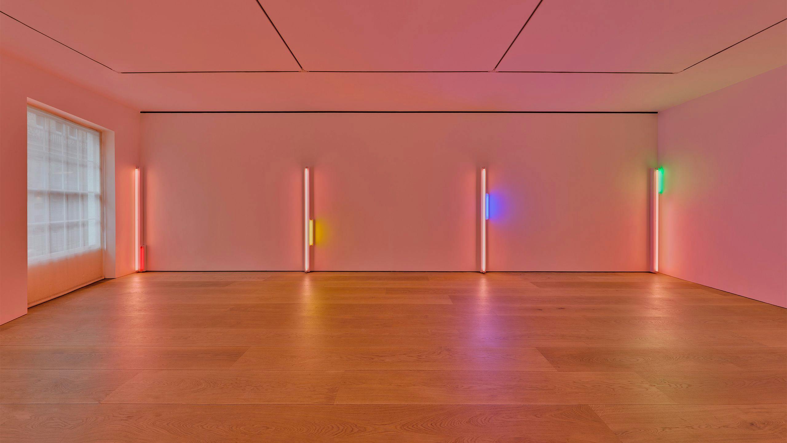 Installation view of an exhibition titled, Dan Flavin: colored fluorescent light, at David Zwirner in London, dated 2023.